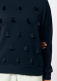 Black sweater with tassels on a white background